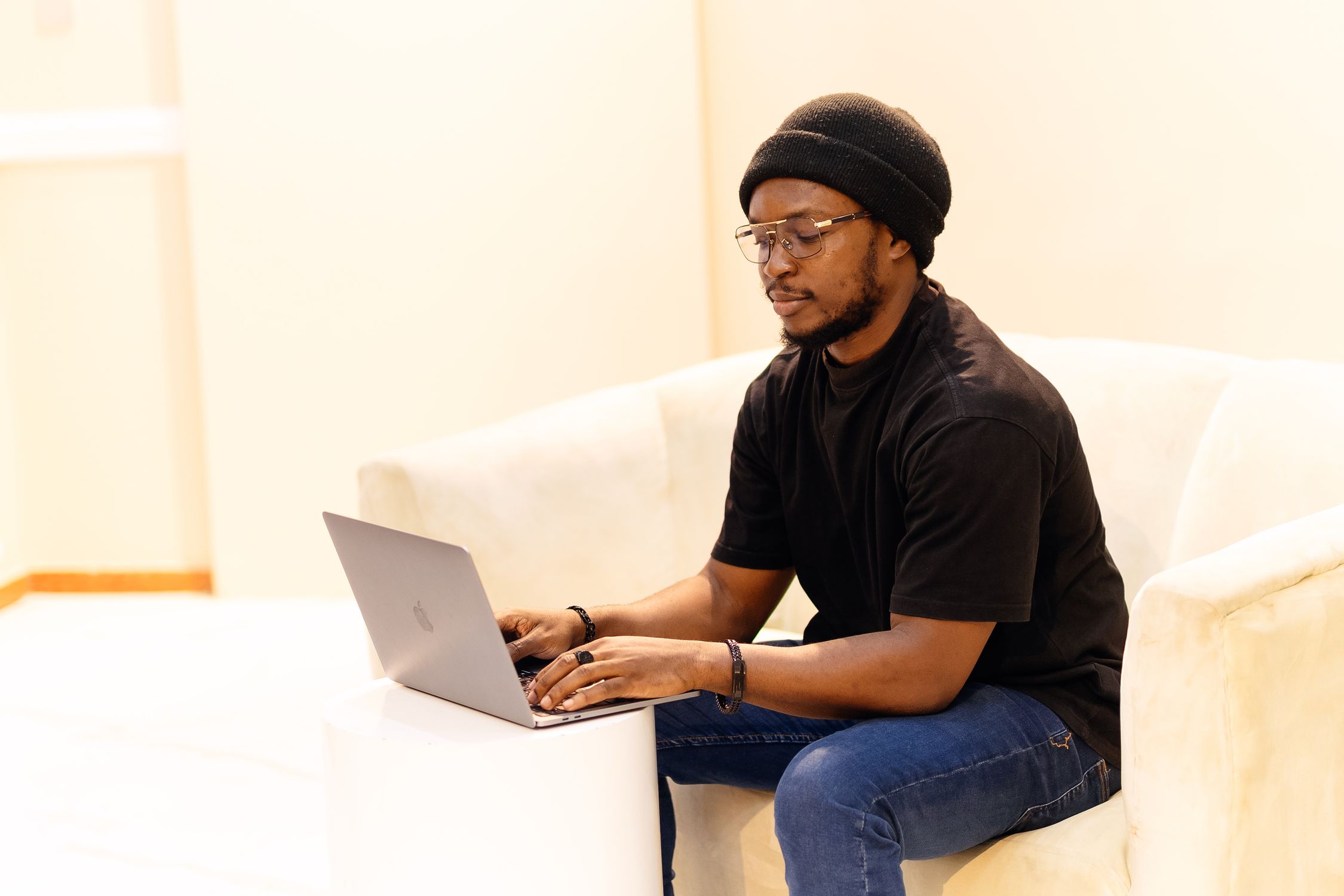 Young professional using Mymanga Connect fiber internet on a laptop